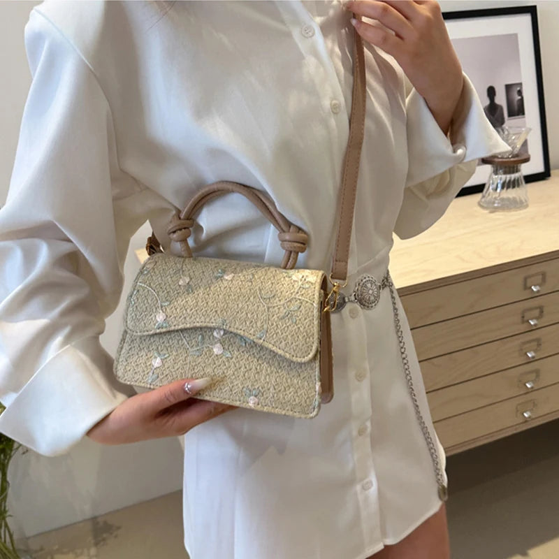 Borsa a mano con tracolla intrecciata in paglia da donna