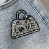 Pantaloncini di jeans strappati con stampa a lettere da donna - Pantaloncini di jeans donna ATREND
