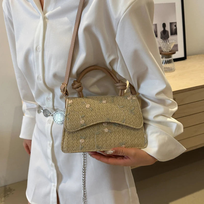 Borsa a mano con tracolla intrecciata in paglia da donna
