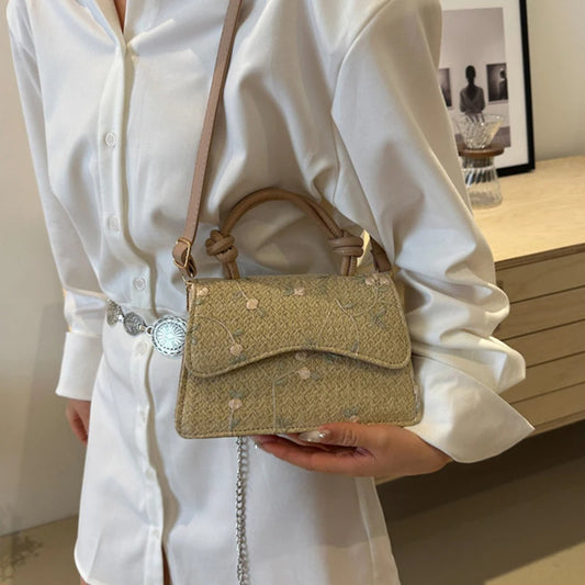 Borsa a mano con tracolla intrecciata in paglia da donna
