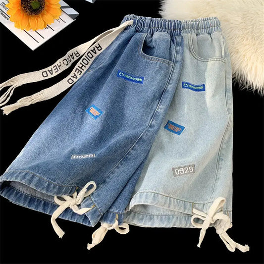 Pantaloncini di jeans con fascia elastica e stampa a lettere da uomo - Pantaloncini in jeans uomo ATREND