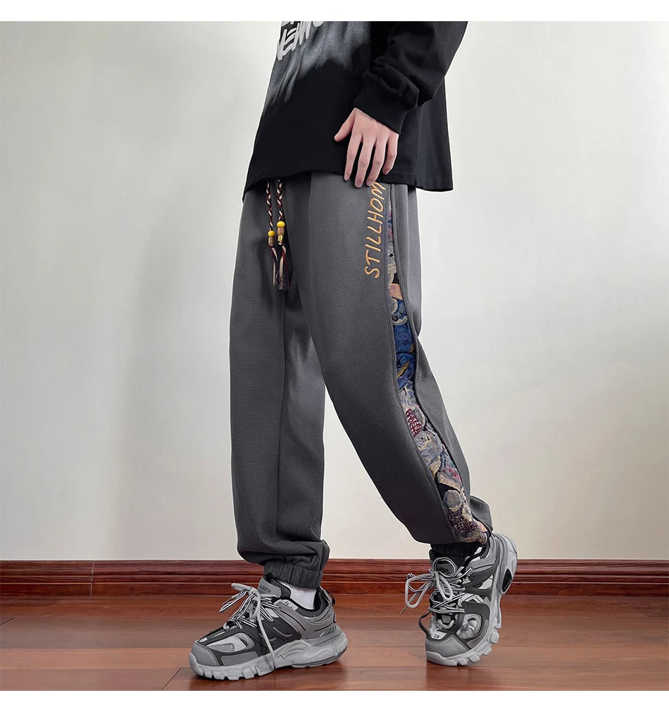 Pantaloni casual con bordo a contrasto con stampa grafica e lacci da uomo - Pantaloni uomo ATREND