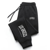 Pantaloni sportivi con fascia elastica e lettere da uomo - Pantaloni sportivi uomo ATREND