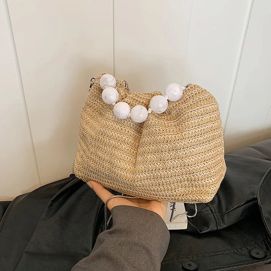 Borsa a mano con tracolla in tessitura di paglia da donna