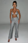 Set coordinato blazer e pantaloni brillantinati da donna