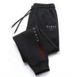 Pantaloni sportivi con fascia elastica e lettere da uomo - Pantaloni sportivi uomo ATREND
