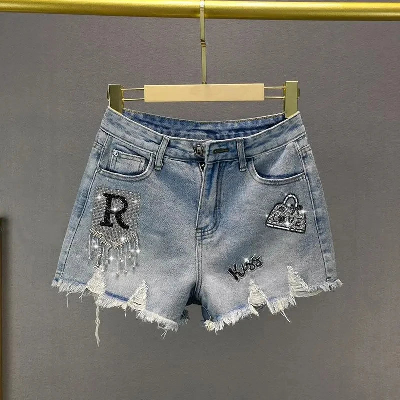 Pantaloncini di jeans strappati con stampa a lettere da donna - Pantaloncini di jeans donna ATREND