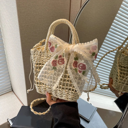 Borsa a mano con tracolla in tessuto di paglia con fiocco da donna