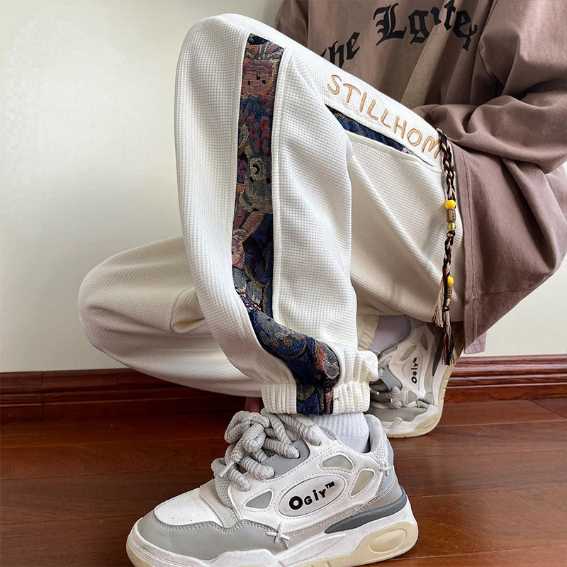 Pantaloni casual con bordo a contrasto con stampa grafica e lacci da uomo - Pantaloni uomo ATREND