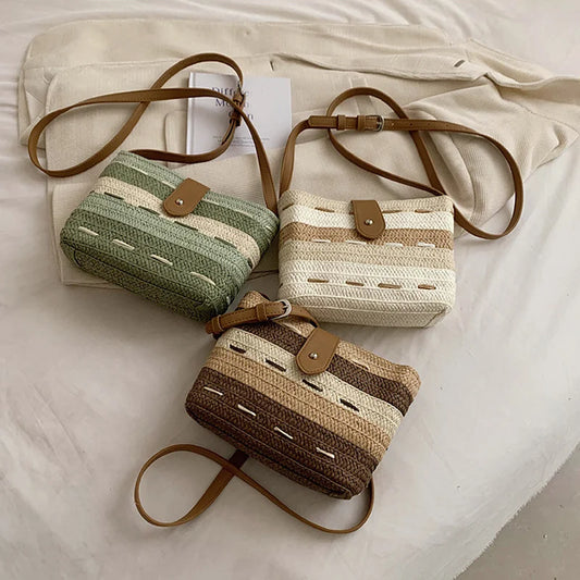 Borsa a tracolla intrecciata in tessitura di paglia da donna