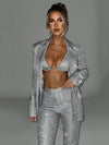Set coordinato blazer e pantaloni brillantinati da donna