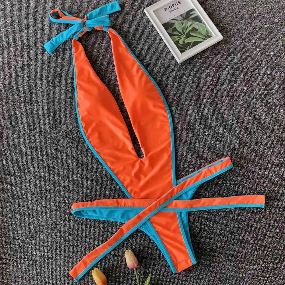 Bikini intero geometrico con scollo profondo a V da donna
