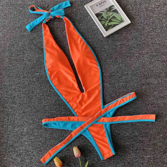 Bikini intero geometrico con scollo profondo a V da donna