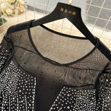 Abito lungo patchwork a maniche lunghe con strass e piume da donna ATREND