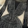 Abito lungo patchwork a maniche lunghe con strass e piume da donna ATREND