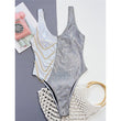 Bikini intero bicolor con paiettes e catene da donna ATREND