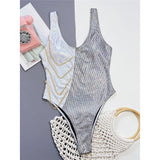 Bikini intero bicolor con paiettes e catene da donna ATREND