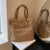 Borsa a spalla casual in tessuto traforata da donna ATREND