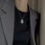Collana con ciondolo numero 7 in acciaio al titanio da uomo ATREND