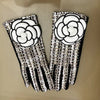 Guanti trendy in lana a strisce con fiore da donna ATREND