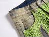 Jeans in denim patchwork con ragnatela neon da uomo ATREND