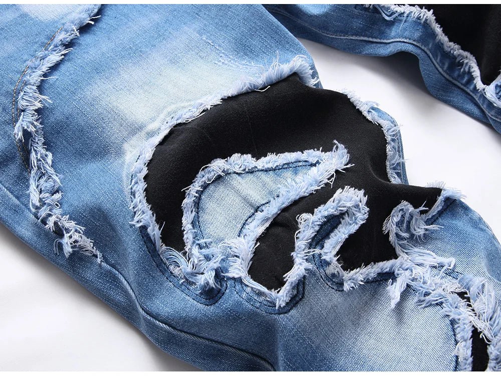 Jeans strappati elasticizzati da uomop ATREND