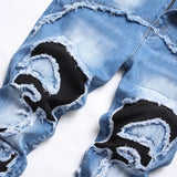 Jeans strappati elasticizzati da uomop ATREND