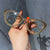 Occhiali da sole cat eyes con brillantini da donna ATREND