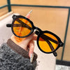 Occhiali da sole rotondi bicolor con lenti trasparenti e colorate unisex ATREND