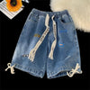 Pantaloncini di jeans con fascia elastica e stampa a lettere da uomo ATREND