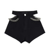 Pantaloncini di jeans scavati con catena da donna ATREND