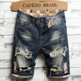 Pantaloncini di jeans strappati da uomo ATREND