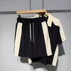 Set coordinato bicolor estivo polo a maniche corte chiusura a zip e pantaloncino da uomo ATREND