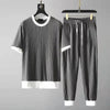 Set coordinato elastico traspirante maglietta maniche corte e pantaloni da uomo ATREND