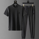 Set coordinato maglietta a maniche corte e pantaloni plisettati da uomo ATREND