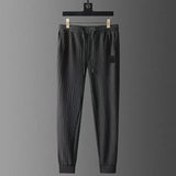 Set coordinato maglietta a maniche corte e pantaloni plisettati da uomo ATREND