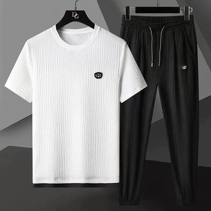 Set coordinato maglietta a maniche corte e pantaloni plisettati da uomo - set coordinato ATREND
