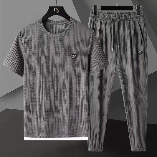 Set coordinato maglietta a maniche corte e pantaloni plisettati da uomo - set coordinato ATREND